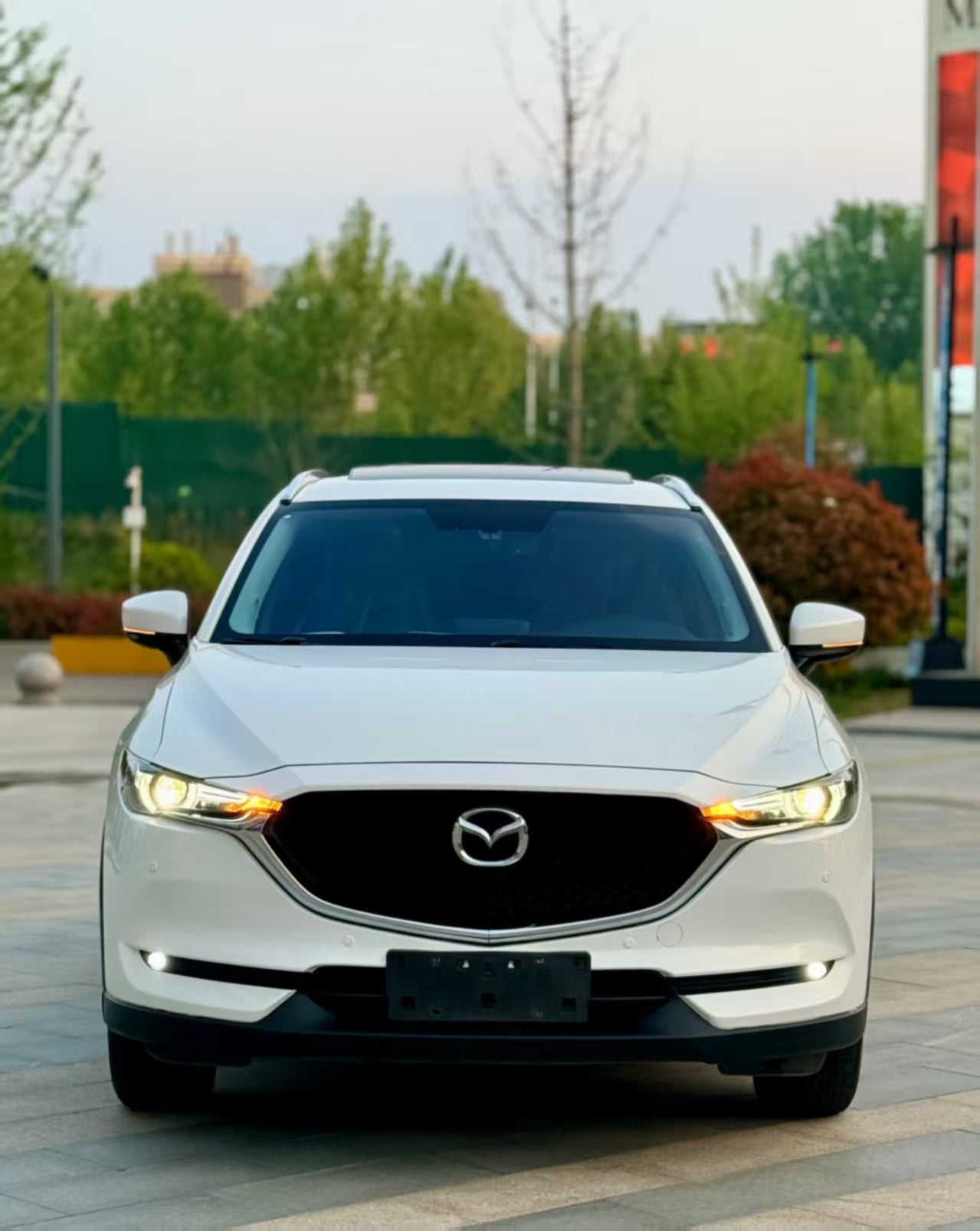 # 标准英文翻译 **2021 Mazda CX-5 2.5L Two-Wheel Drive Premium Edition (Automatic Transmission)**  ### 汽车行业精简通用版（外贸/海报常用） **2021 Mazda CX-5 2.5L FWD Supreme AT** - FWD = 前置前驱（两驱） - AT = 自动挡 - Supreme = 智尊型